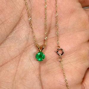 Shop natural emerald pendant 0.31–0.55 ct round AA quality in 14K yellow gold with 18 inch chain. Perfect May birthstone fine jewelry gift.