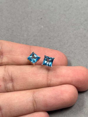 Swiss Blue Topaz stud earrings in 14K yellow gold
