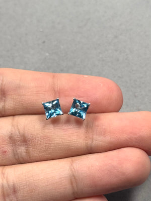 Swiss Blue Topaz stud earrings in 14K white gold