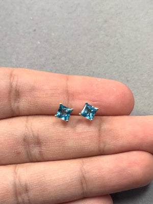 Swiss Blue Topaz stud earrings in 14K yellow gold