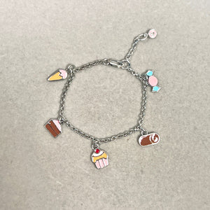 Diamond charm kids bracelet in sterling silver cake design