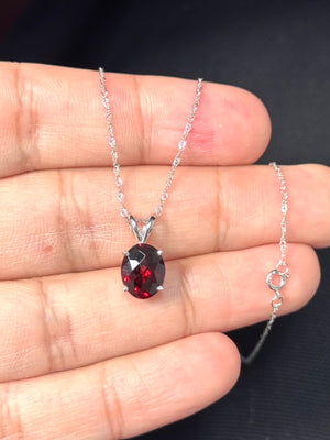 natural garnet solitaire pendant in 14k white gold oval gemstone