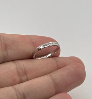 Channel-set princess-cut diamond wedding band