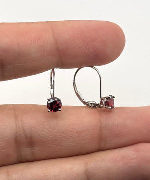 Elegant garnet lever back earrings styled for anniversary gift inspiration