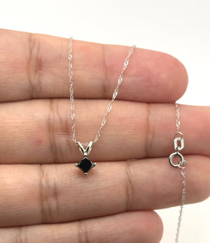 latinum pendant side profile showing four-prong setting and high polish craftsmanship 