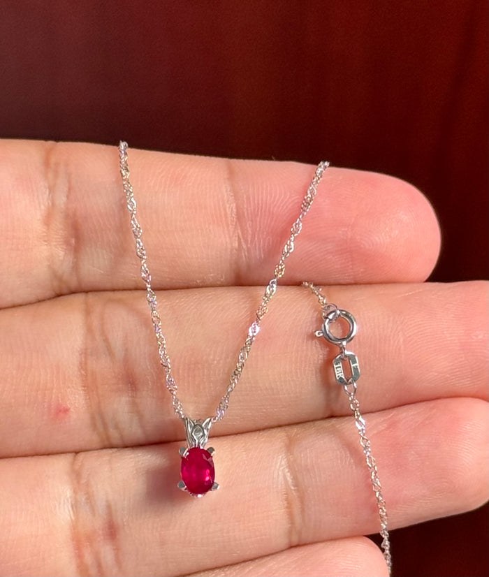 0.50-0.65 Ct Oval Ruby Pendant 6x4mm AA Scroll Solitaire in Platinum with 18-Inch White Gold Chain