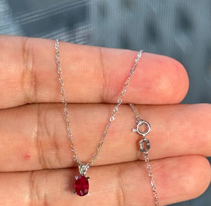 0.50-0.65 Ct Oval Ruby Pendant 6x4mm AA Scroll Solitaire in Platinum with 18-Inch White Gold Chain