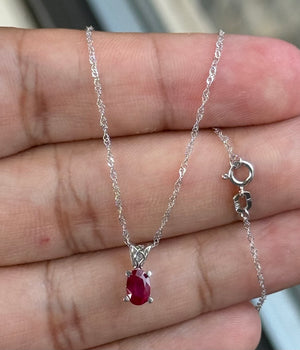 0.50-0.65 Ct Oval Ruby Pendant 6x4mm AA Scroll Solitaire in Platinum with 18-Inch White Gold Chain