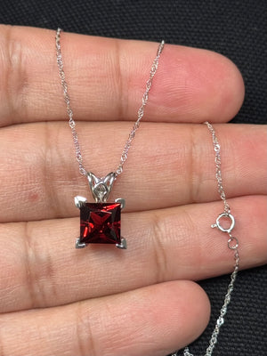 natural garnet scroll pendant in 14k white gold princess cut