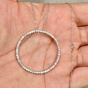 anniversary gift setup with diamond pendant and romantic decor