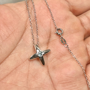 swiss blue topaz star pendant in sterling silver with cable chain