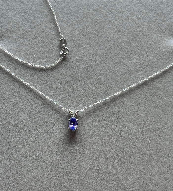 Platinum Tanzanite Pendant, AA Oval 6.5x4.5 mm (~0.60 Ct), Solitaire, 18" 18K White Gold Singapore Chain
