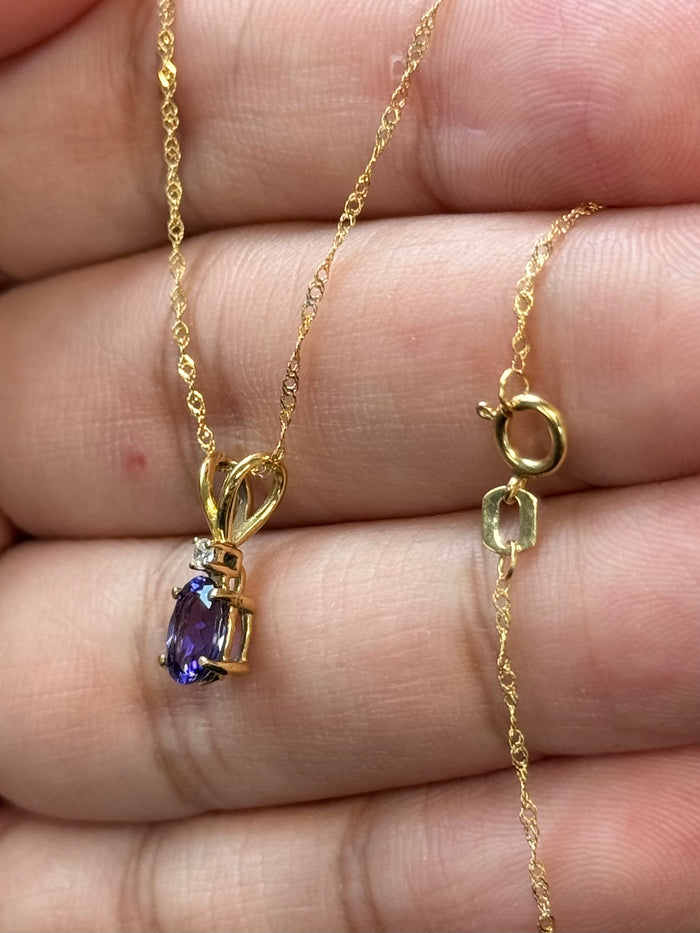 Tanzanite & Diamond Pendant AAA Oval 6.5x4.5 mm (0.60 Ct) + 0.03 Ct Diamond, 18K Yellow Gold, 18" Singapore Chain