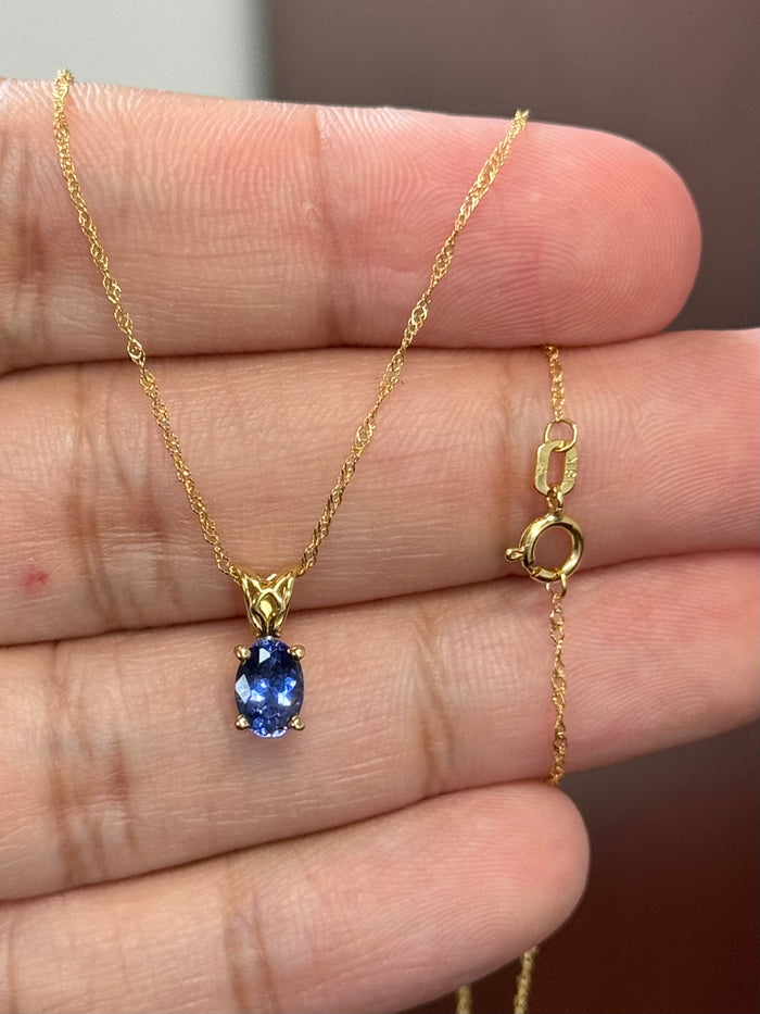 AAA Tanzanite Pendant Oval 6.5x4.5 mm, 0.60 Ct, 18K Yellow Gold Scroll Solitaire, 18" Singapore Chain