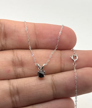 Side profile revealing four secure prongs and the polished 14K white gold setting 