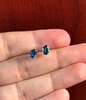 London Blue Topaz Stud Earrings in Platinum, AAA Oval 7x5 mm, 1.84–2.53 Ct TW, Scroll Four-Prong Setting