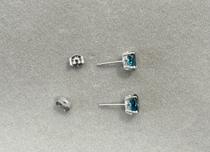 London Blue Topaz Stud Earrings in Platinum, AAA Oval 7x5 mm, 1.84–2.53 Ct TW, Scroll Four-Prong Setting