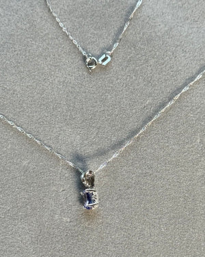 Platinum Scroll Pendant with AA Oval Tanzanite 6.5x4.5 mm, 0.55–0.89 Ct, Includes 18" 18K White Gold Singapore Chain