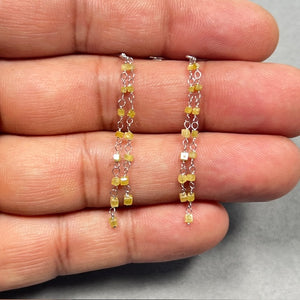2.00 Ct greenish yellow diamond bead drop earrings in 18K white gold with rhodium finish, featuring fifteen heated natural yellow diamond beads per pair and secure French wire backs, elegant modern dangle design for women with luminous medium yellow sparkle. 