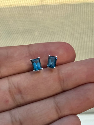 AAA London Blue Topaz Stud Earrings 1.78 Ct Emerald Cut 7x5 mm, Platinum Scroll Setting