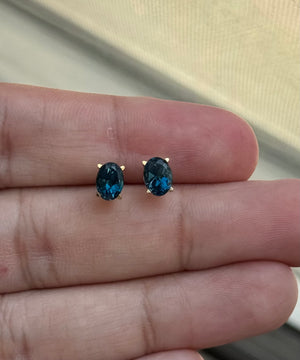 1.84–2.53 Ct AAA Oval London Blue Topaz Scroll Stud Earrings | 14K Yellow Gold Elegant Jewelry