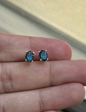1.84–2.53 Ct AAA Oval London Blue Topaz Scroll Stud Earrings | 14K Yellow Gold Elegant Jewelry