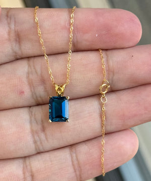 Emerald Cut London Blue Topaz Pendant 9x7mm AAA 2.55-3.46 Ct in 14K Yellow Gold with 18 Inch Chain – Solitaire Scroll Design