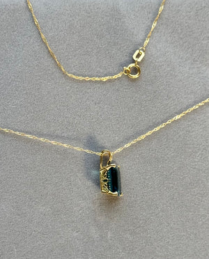 3.41-4.77 Cts of 10x8 mm AAA Emerald Cut London Blue Topaz Scroll Solitaire Pendant in 18K Yellow Gold