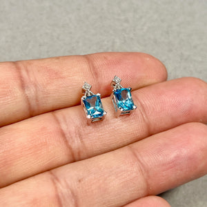 ecure stud backing detail in polished 14K white gold showing craftsmanship quality