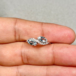aquamarine diamond ring in 18K white gold with marquise stones and prong setting elegant gemstone jewelry