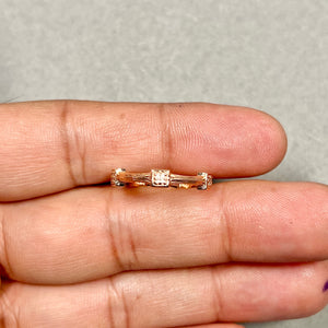 14K rose gold diamond wedding ring with prong set round stones minimalist band design