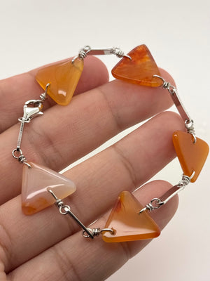 7.25-inch carnelian bracelet shown for scale with linked trillion-shaped gemstone details 