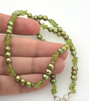 Peridot and peacock pearl necklace presented in gift-ready packaging for birthdays and meaningful celebrations 