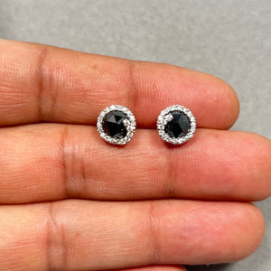 3.33 Ct black and white diamond stud earrings in 14K white gold featuring round rose cut black diamonds totaling 3.04 carats, haloed by 0.28 carat white diamonds in prong setting with rhodium finish and secure post friction backs, elegant luxury fine jewelry for women. 