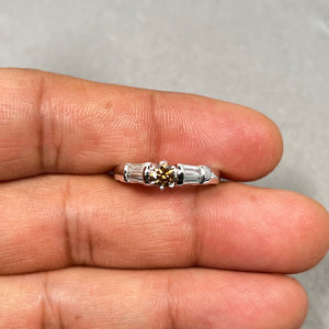 14K white gold diamond ring for women featuring a 0.36 ct natural brown round diamond in prong setting, accented by four baguette white diamonds totaling 0.20 ct in channel setting. Rhodium finished band, size 7.5, elegant chocolate and white diamond fine jewelry piece with 0.56 ct total weight. 