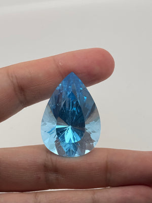 Swiss blue topaz pear 130 carat loose gemstone close up