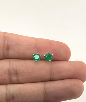 AA round emerald gemstones showing rich green color and natural crystal character