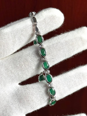 0.32 Ct Diamond -10.70 Ct Natural Emerald Eternity Bracelet  7x5 mm Oval Emerald & Diamond Tennis Bracelet in 14K White Gold