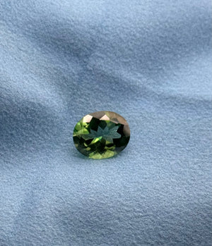 swiss green topaz oval 12x10mm coated gemstone