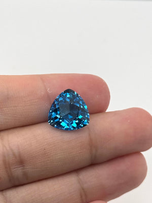 Trillion checker cut blue topaz for statement ring
