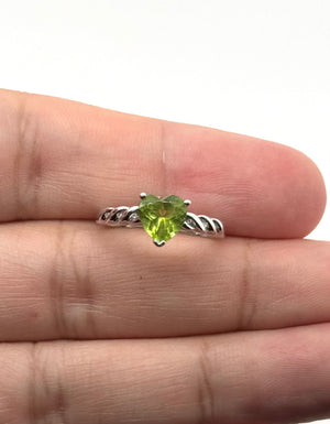 stacked ring styling with green gemstone statement piece