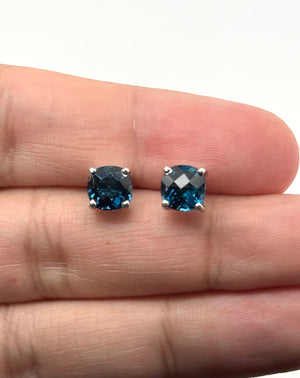 matching jewelry styling with blue gemstone studs and necklace