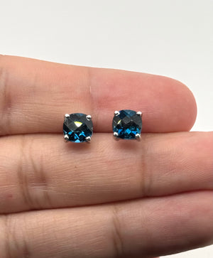 london blue topaz cushion stud earrings in 14k white gold with checkered cut