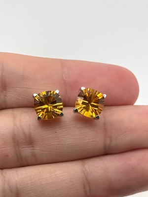 matching jewelry styling with yellow gemstone studs and necklace