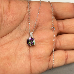 Mystic fire topaz filigree pendant in 14K white gold featuring a 2.12 ct cushion checkerboard cut gemstone with green and reddish hues, accented by 0.04 ct round diamonds. Elegant vintage-inspired design with intricate detailing, paired with an 18 inch Singapore chain, perfect statement jewellery for women. 