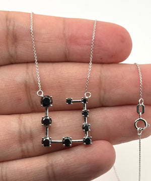 statement necklace styled for formal occasion