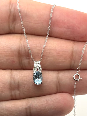 oval aquamarine diamond pendant in 14k white gold necklace