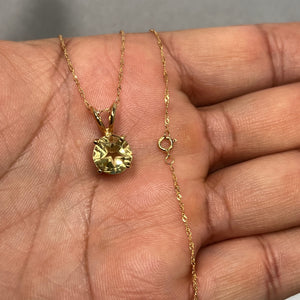 Close-up of a 9mm Texas Star Lemon Citrine solitaire pendant in solid 14K Yellow Gold, showing the bright medium-yellow gemstone sparkle on an 18-inch Singapore chain, a fine women’s jewellery piece perfect for everyday elegance and special occasions. 