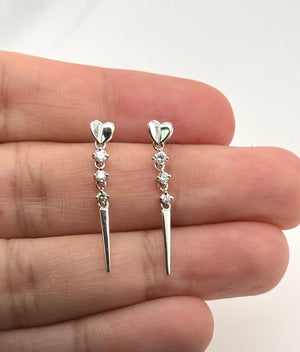 Diamond dangle earrings in 18K white gold with prong setting elegant diamond jewelry