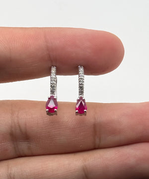 Ruby drop earrings in 14K white gold with diamond accents prong setting elegant ruby